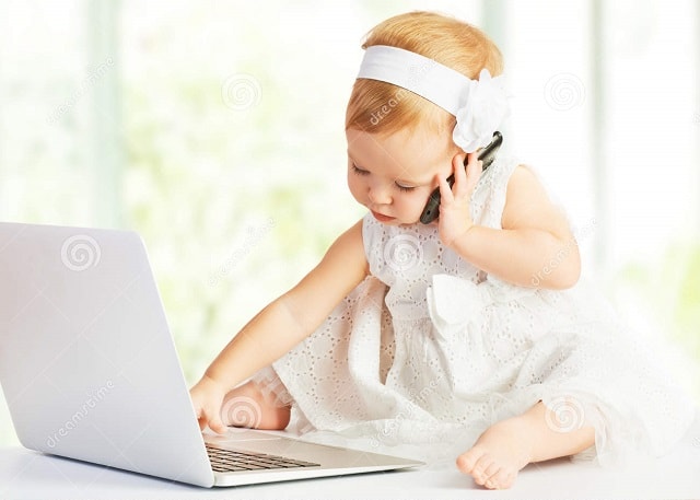 Baby girl on laptop